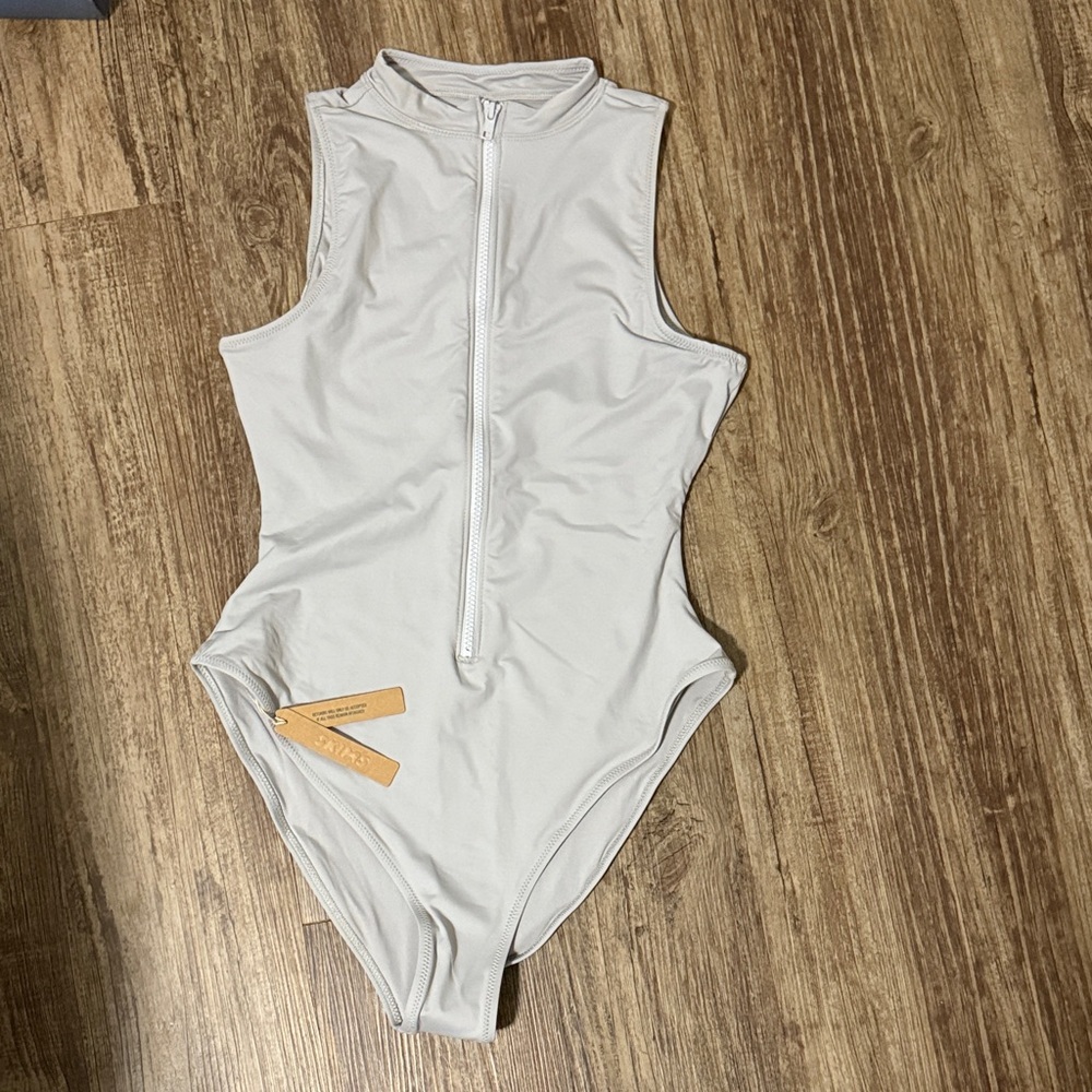 Skims Sleeveless Zip-Up One Piece Swim Suit